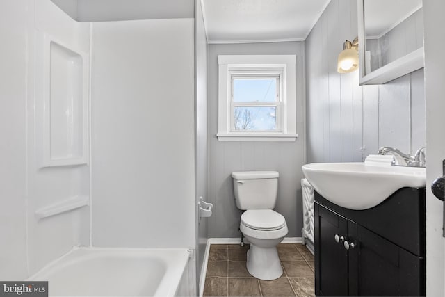 full bath featuring toilet, tile patterned floors, baseboards, and vanity