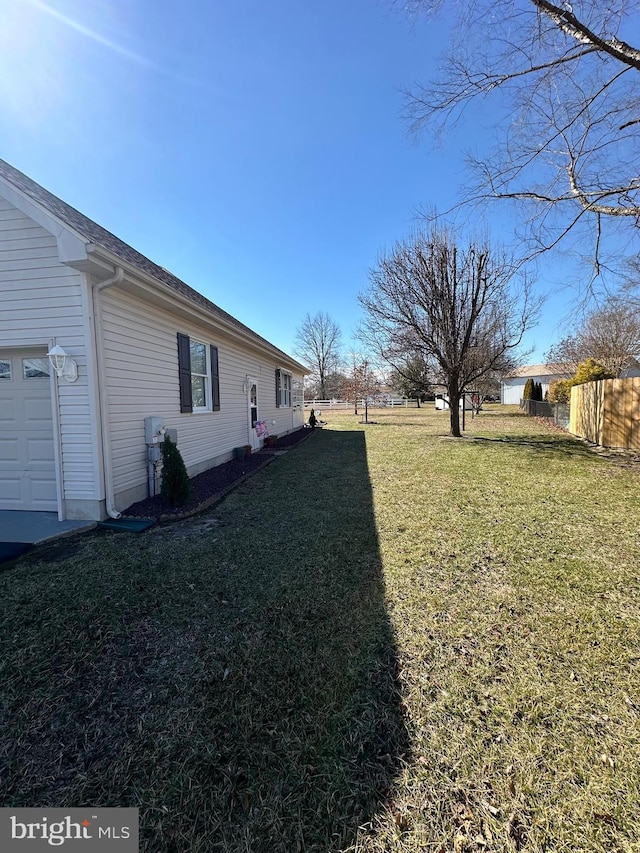 view of yard with fence