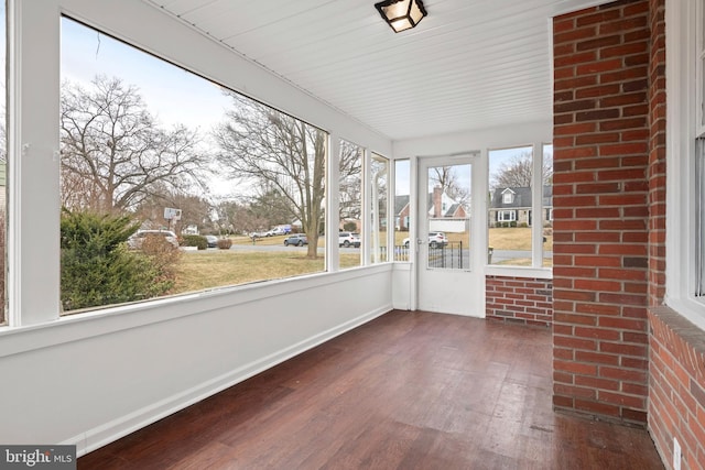 unfurnished sunroom with a healthy amount of sunlight