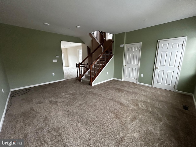 3351 Landmark Ct, Chambersburg, PA 17201 - unfurnished living room with carpet floors, baseboards, visible vents, and stairs