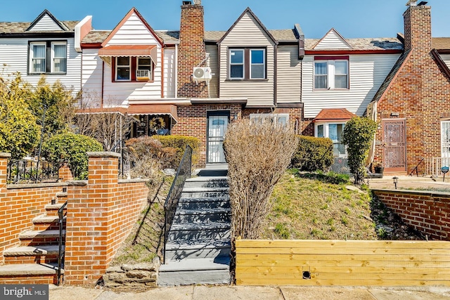 multi unit property featuring brick siding