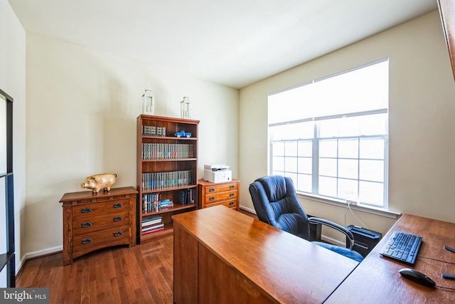 office with dark wood-style flooring