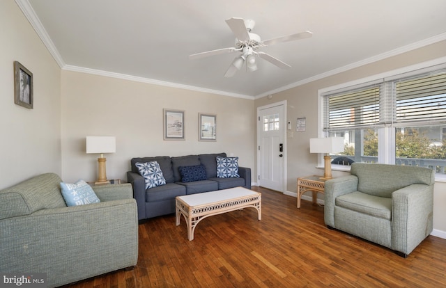 living area with ceiling fan, baseboards, hardwood / wood-style floors, and ornamental molding