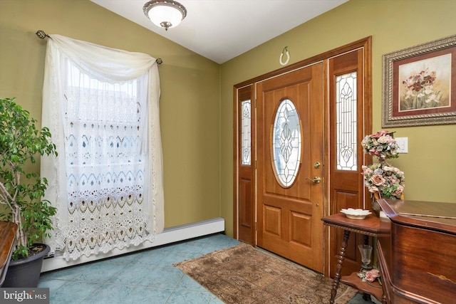 foyer entrance featuring a baseboard radiator, lofted ceiling, and tile patterned flooring