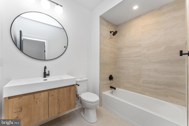 bathroom featuring vanity, toilet, and shower / bath combination