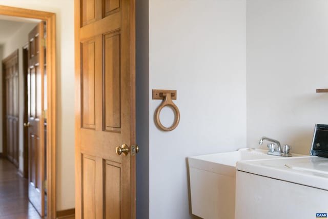 laundry room featuring laundry area and washer / clothes dryer