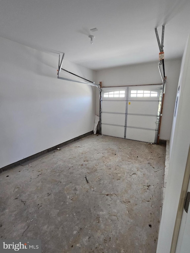 garage featuring baseboards