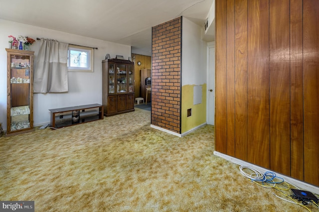 empty room featuring carpet flooring and visible vents