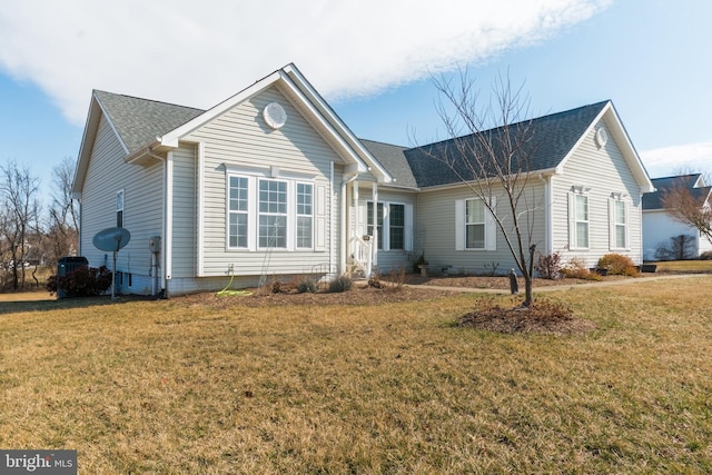 single story home with a front lawn