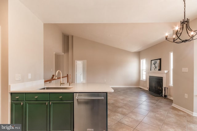 kitchen with a sink, open floor plan, green cabinets, dishwasher, and vaulted ceiling