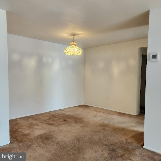 view of carpeted spare room