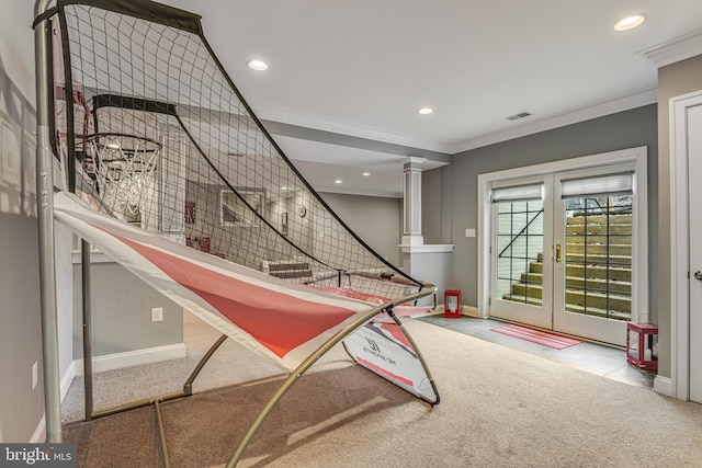 recreation room with crown molding, baseboards, carpet, decorative columns, and recessed lighting