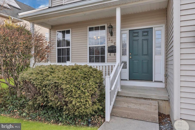 entrance to property with a porch