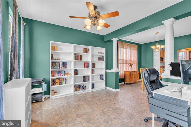 office featuring ceiling fan with notable chandelier, baseboards, and decorative columns