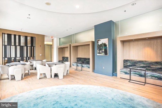 living room with recessed lighting and wood finished floors