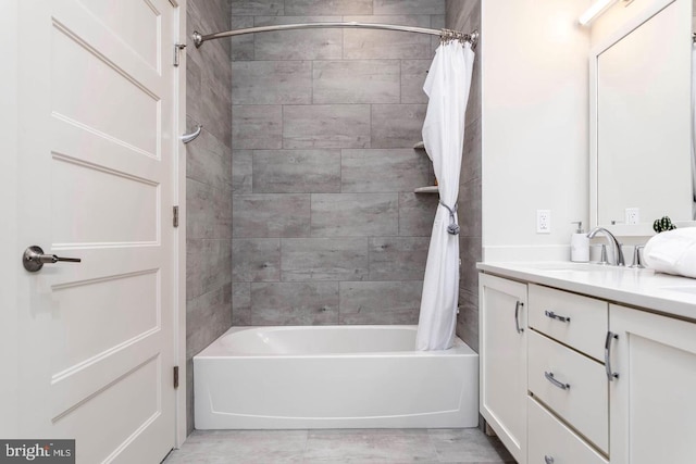 bathroom with vanity and shower / bath combo