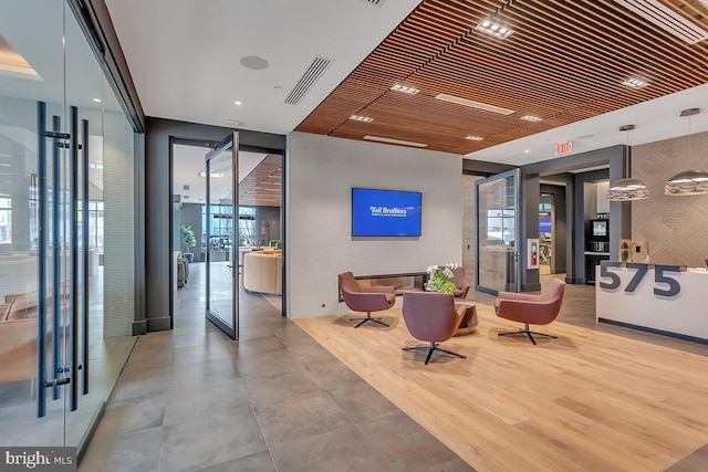 building lobby featuring visible vents