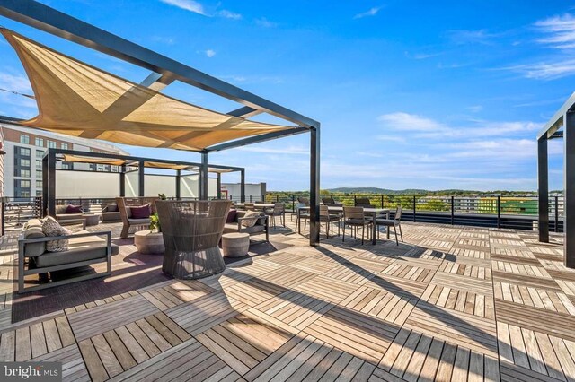 575 S Goddard Blvd Unit 210, King Of Prussia, PA 19406 - deck featuring a mountain view, an outdoor hangout area, and outdoor dining area