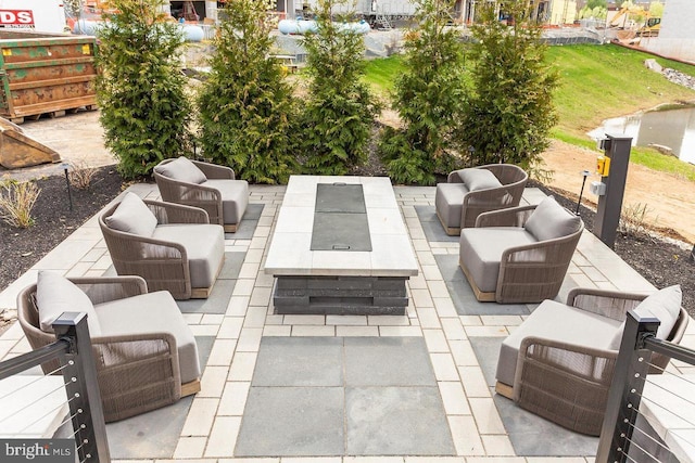 575 S Goddard Blvd Unit 210, King Of Prussia, PA 19406 - view of patio with an outdoor living space with a fire pit
