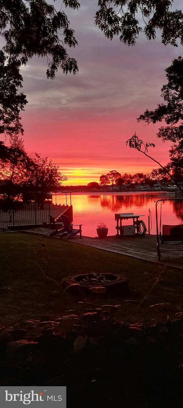 property view of water featuring a dock