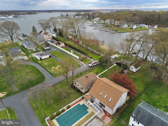 bird's eye view with a residential view and a water view