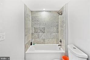 full bathroom with shower / washtub combination and toilet