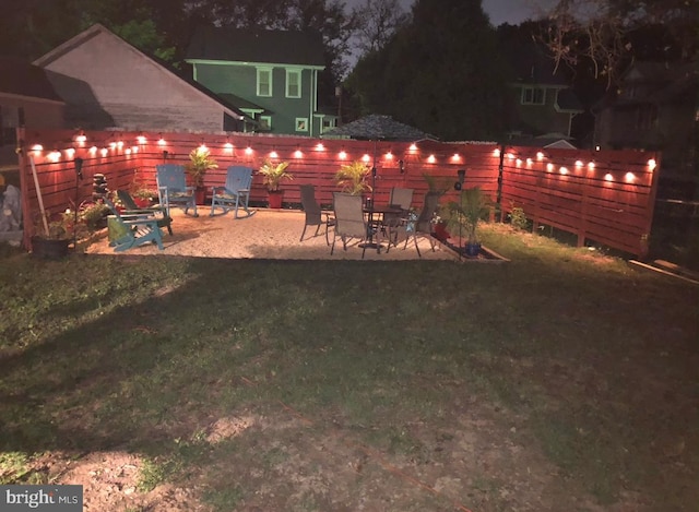 view of yard featuring a fenced backyard and a patio