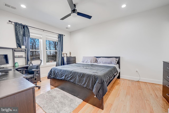 bedroom featuring wood finished floors, visible vents, baseboards, recessed lighting, and ceiling fan