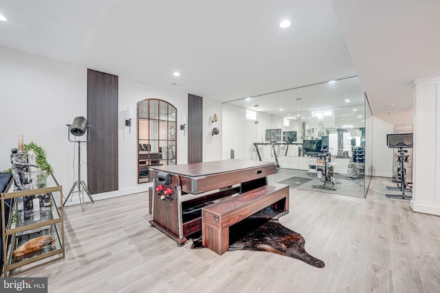 interior space with recessed lighting, light wood-type flooring, and baseboards