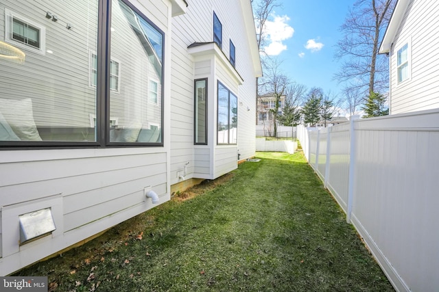 view of yard featuring fence