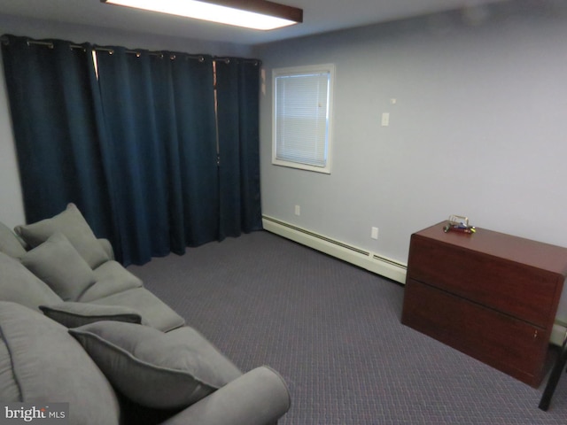 home theater featuring carpet floors and a baseboard radiator