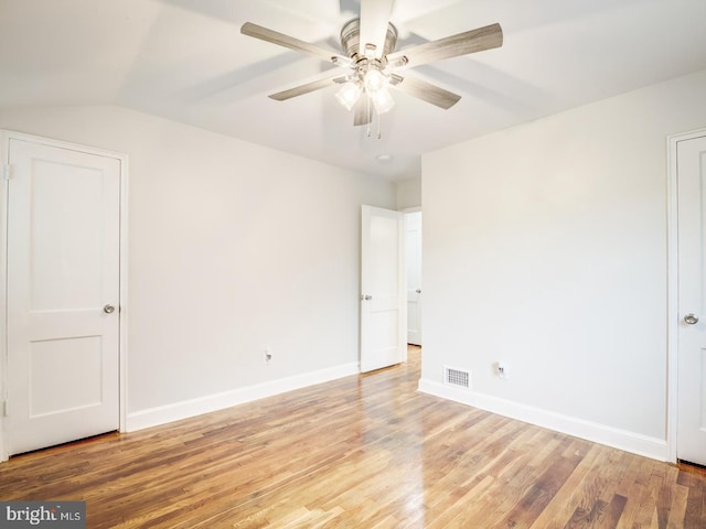 unfurnished bedroom featuring visible vents, baseboards, light wood-type flooring, and ceiling fan