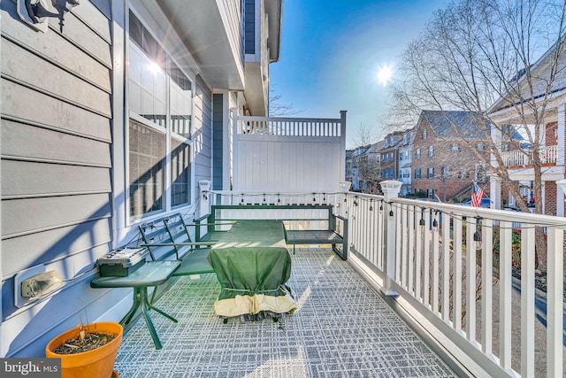 balcony featuring a residential view