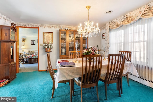 carpeted dining area with a chandelier, visible vents, baseboards, and a baseboard radiator