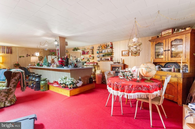 dining space featuring carpet floors