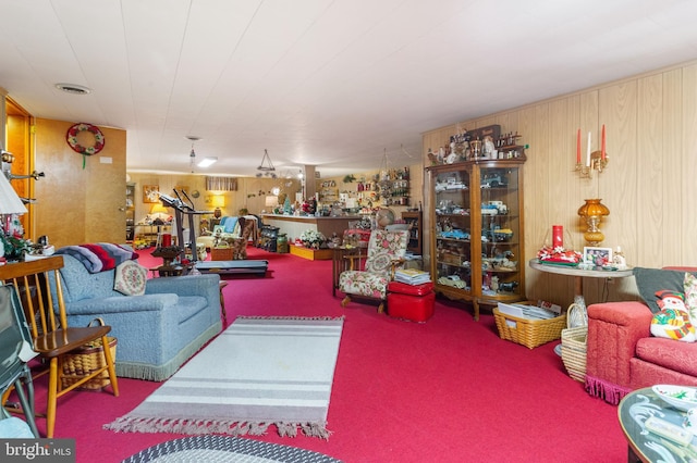 carpeted living area with visible vents