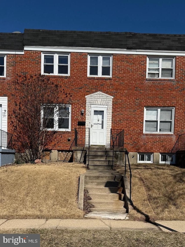 multi unit property with brick siding