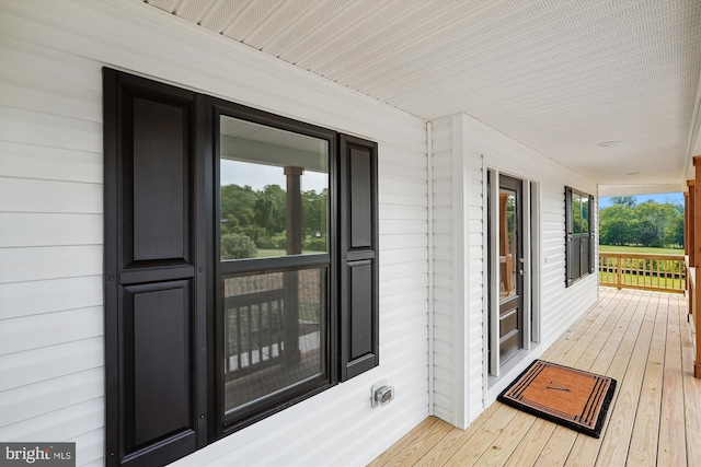 wooden terrace with covered porch
