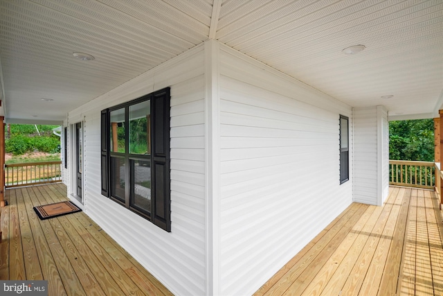 wooden deck with a porch