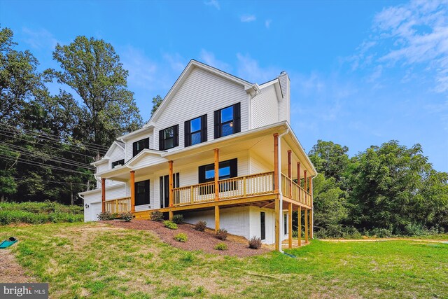 view of front of home with a chimney and a front lawn