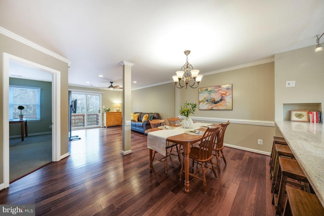 dining area featuring ornamental molding, ceiling fan with notable chandelier, baseboards, and dark wood-style flooring