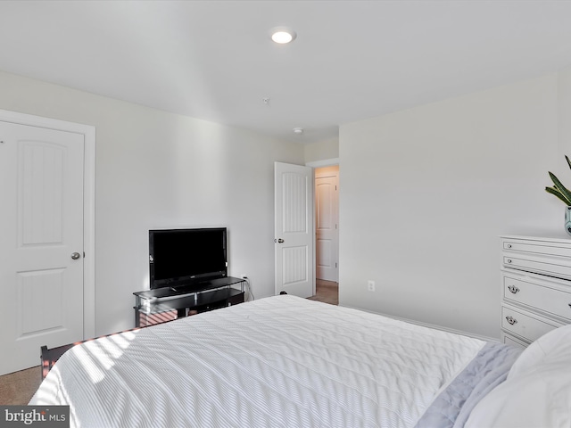 bedroom with recessed lighting