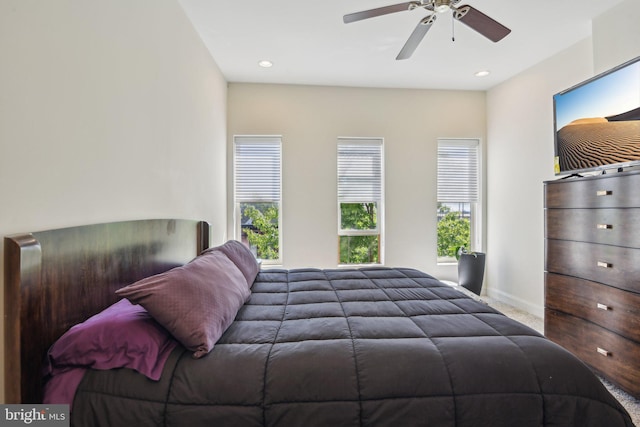 bedroom with baseboards, recessed lighting, carpet, and a ceiling fan