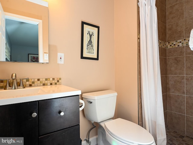 bathroom with toilet, a stall shower, decorative backsplash, and vanity