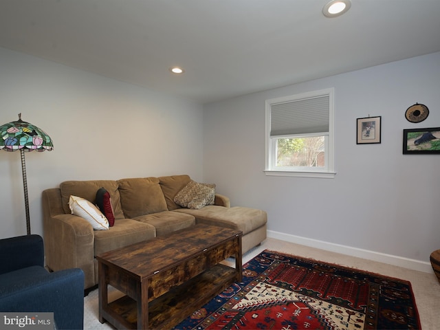 living room with light carpet, baseboards, and recessed lighting