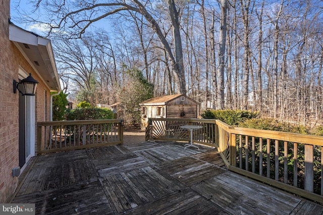 wooden terrace with an outdoor structure