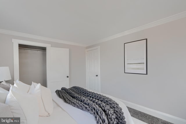 carpeted bedroom featuring baseboards and ornamental molding