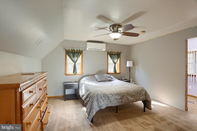 bedroom featuring a wall unit AC, a ceiling fan, baseboards, and light carpet