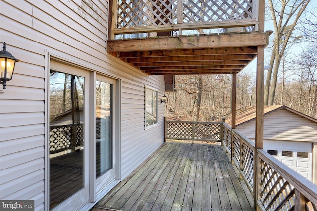 deck featuring an outdoor structure