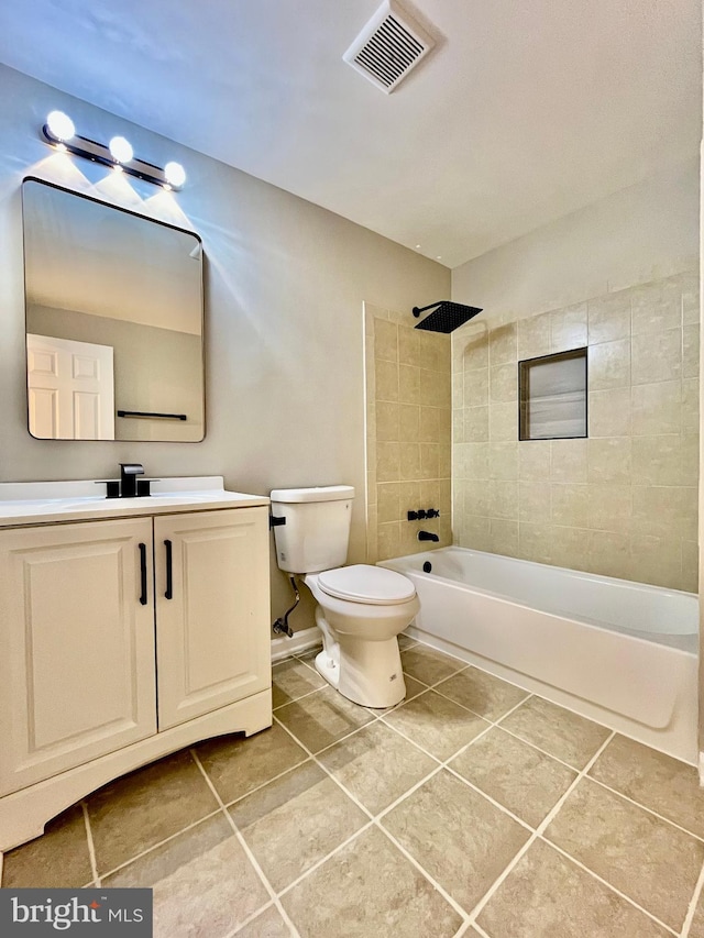 full bathroom with tile patterned flooring, visible vents, toilet, and shower / bath combination